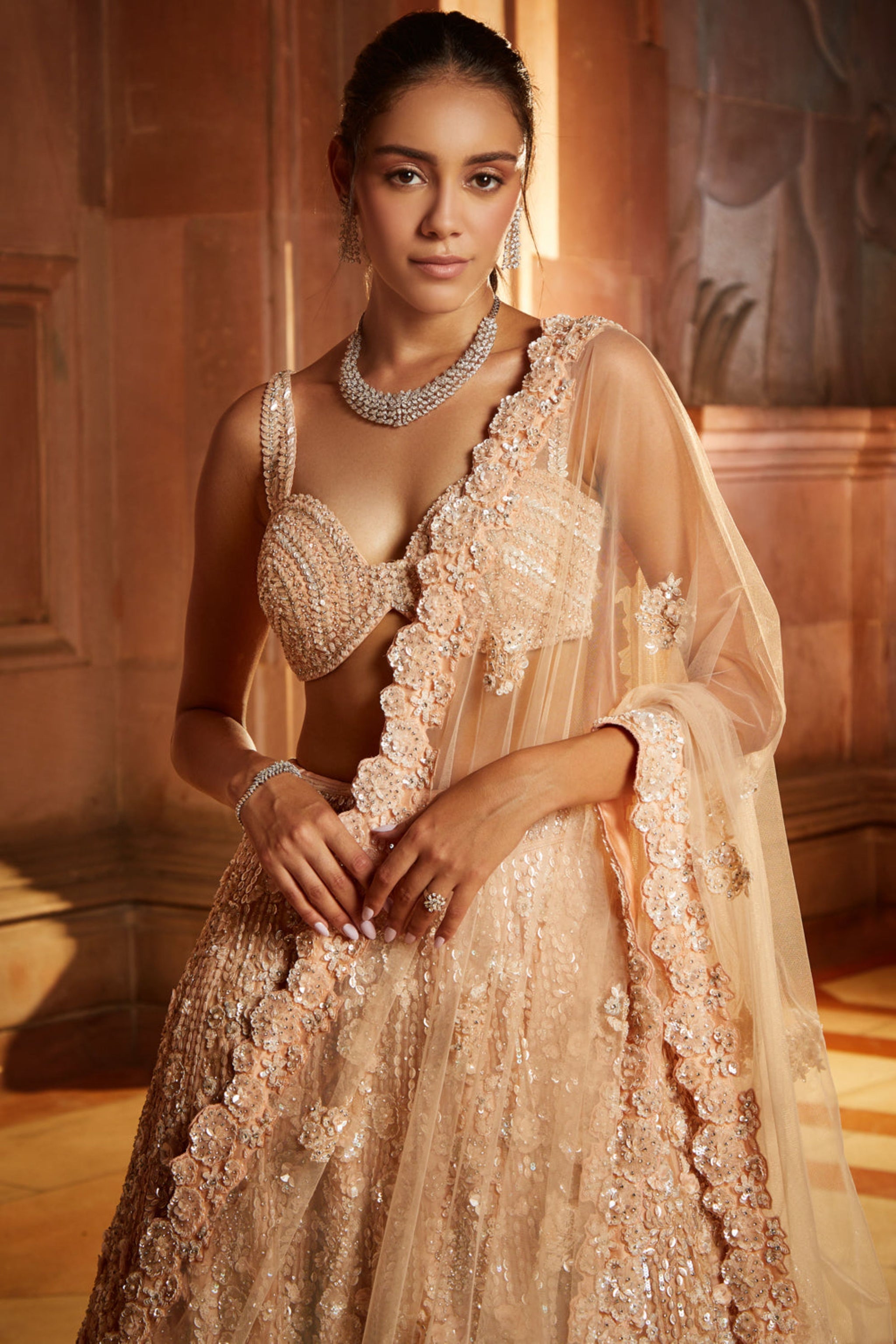 Peach lehenga with jewellery on sale