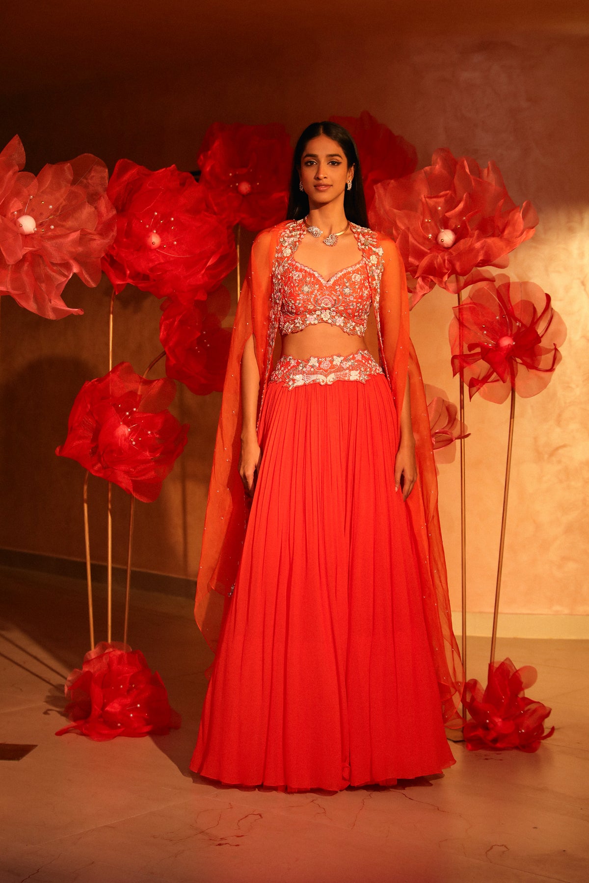 Glamorous orange lehenga and cape set