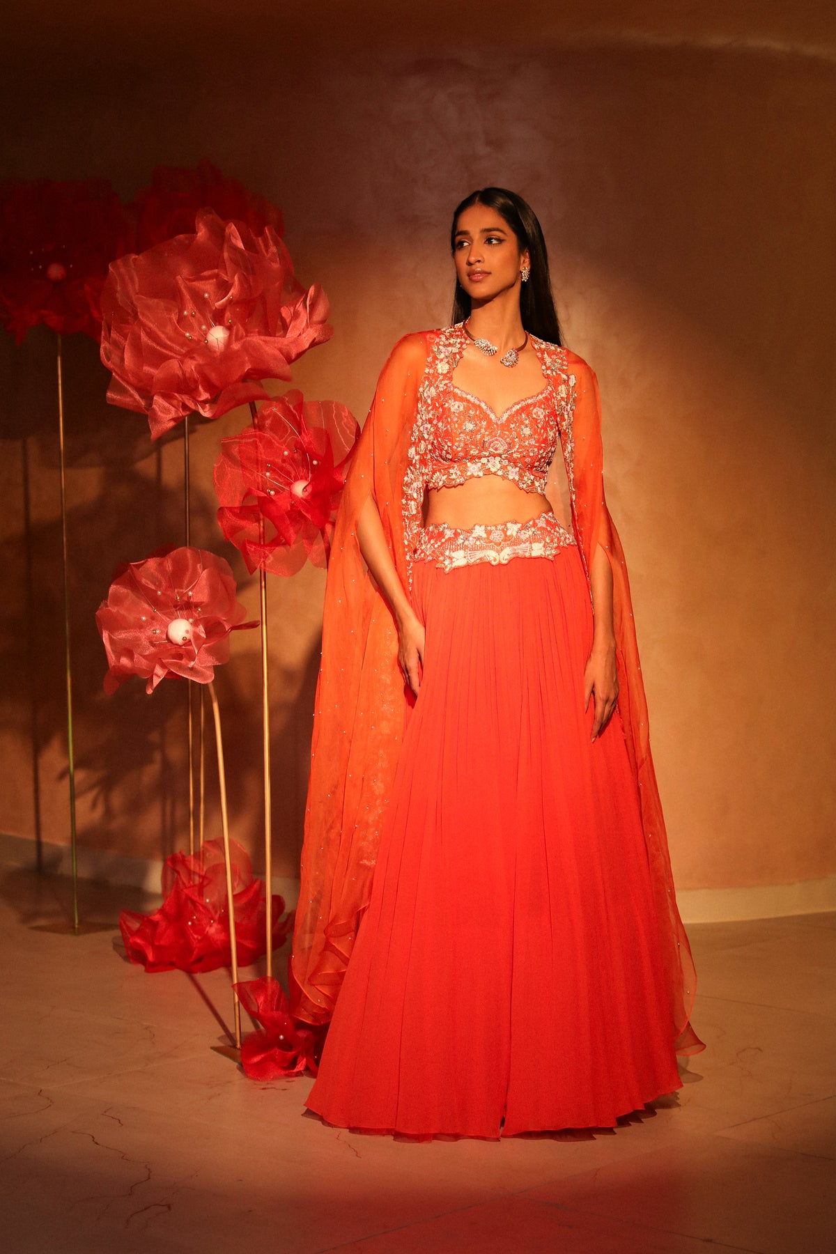 Glamorous orange lehenga and cape set