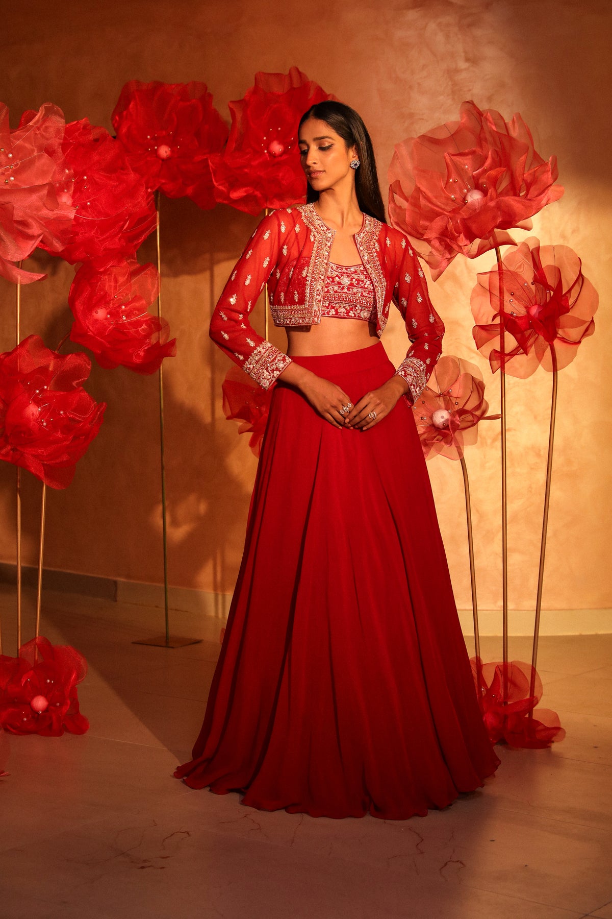 Radiant red lehenga set with embroided jacket