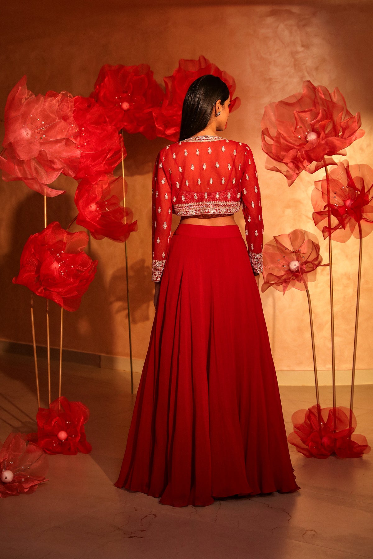 Radiant red lehenga set with embroided jacket