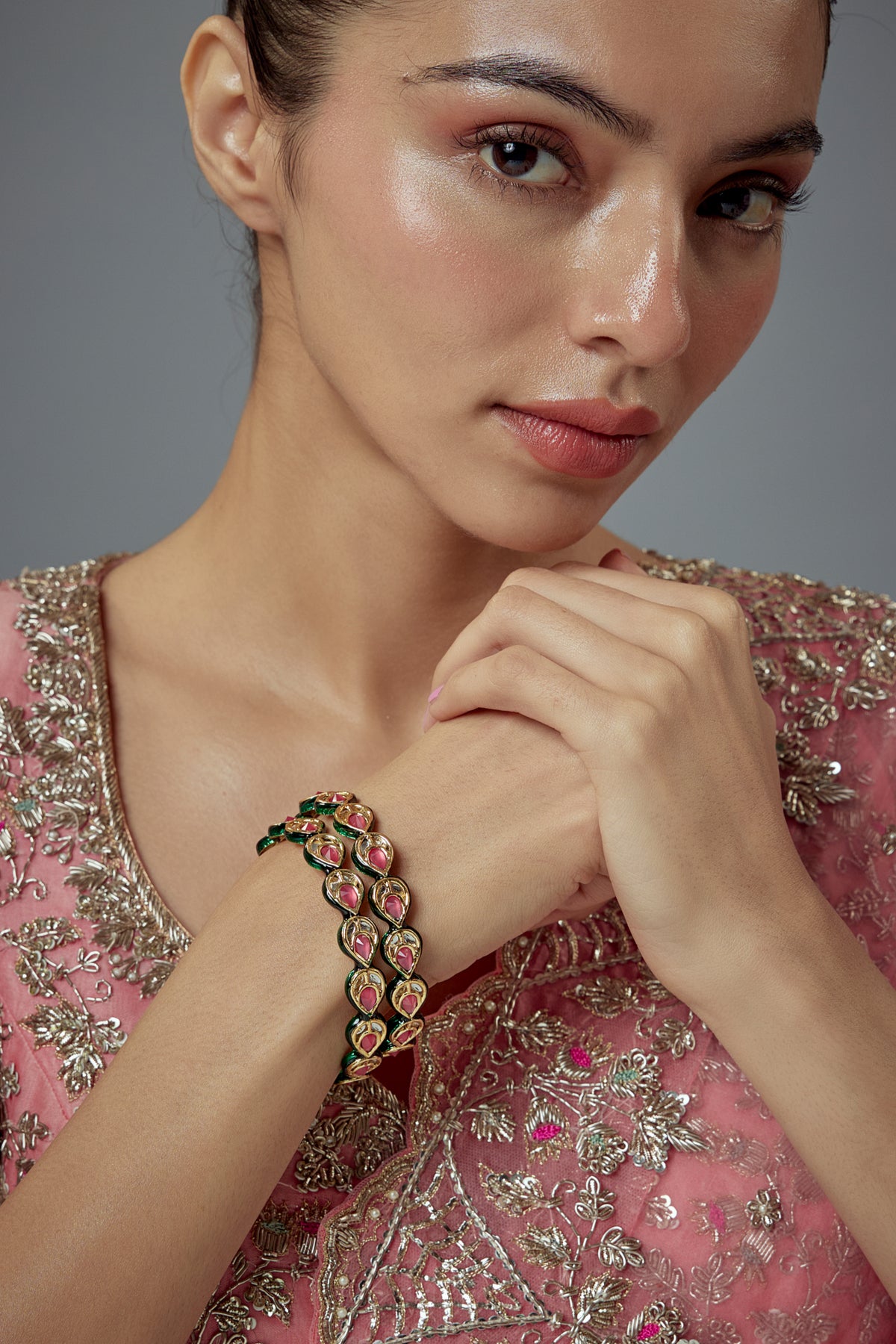 Saadgi Gold Plated Red Kundan Bangles