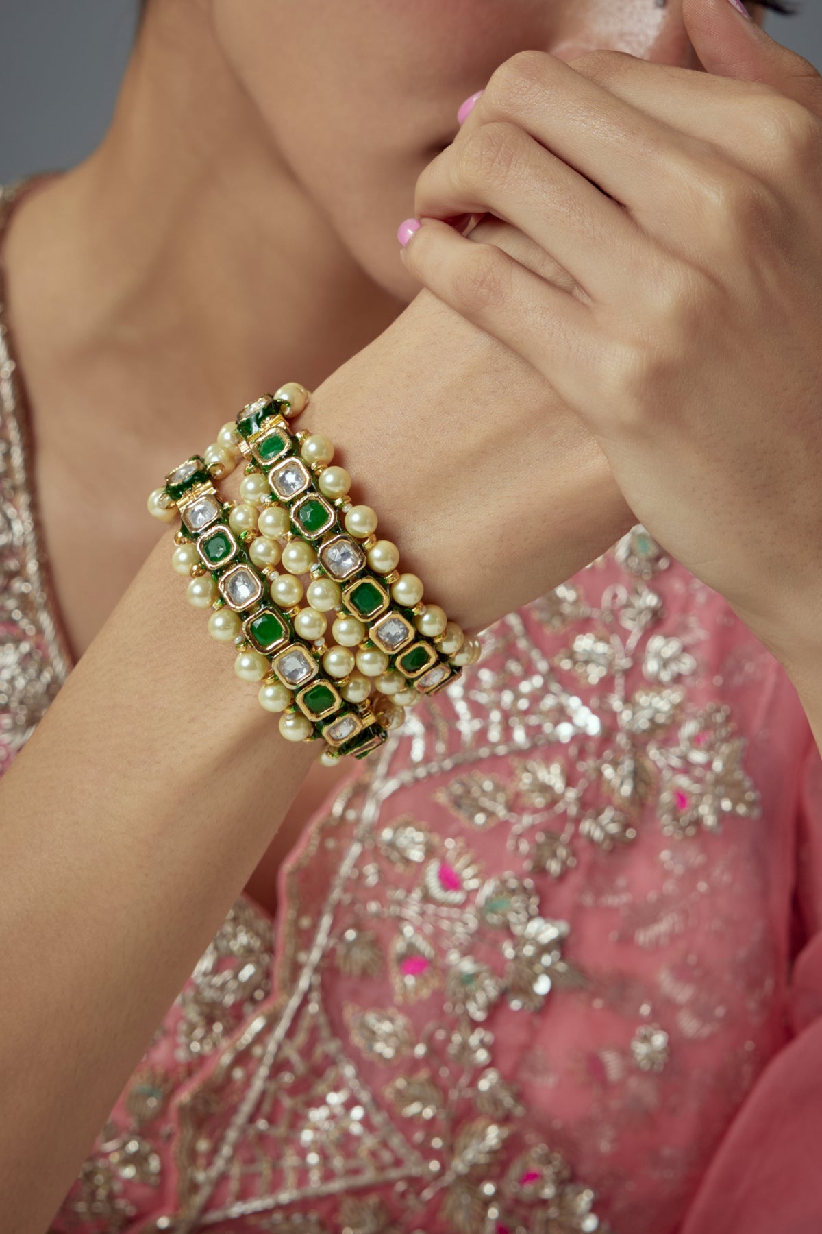 Saadgi Gold Green Gemstones Bangles