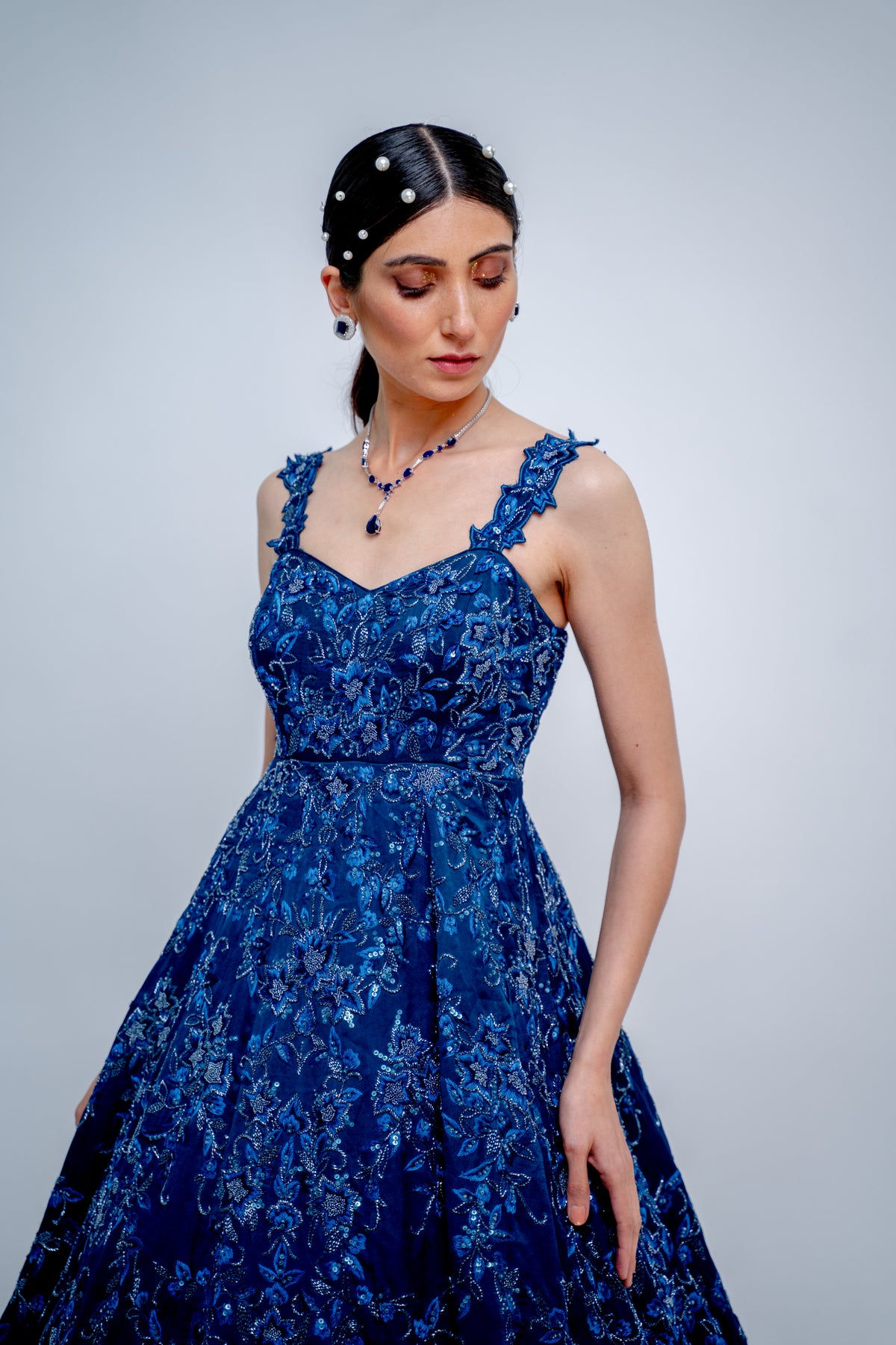 Sapphire blue floral gown